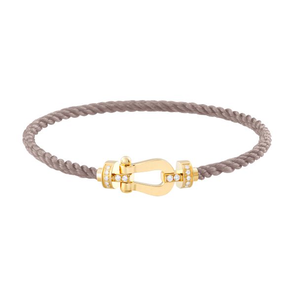 Bracelet Fred Force 10 moyen modèle en or jaune, diamants et câble taupe