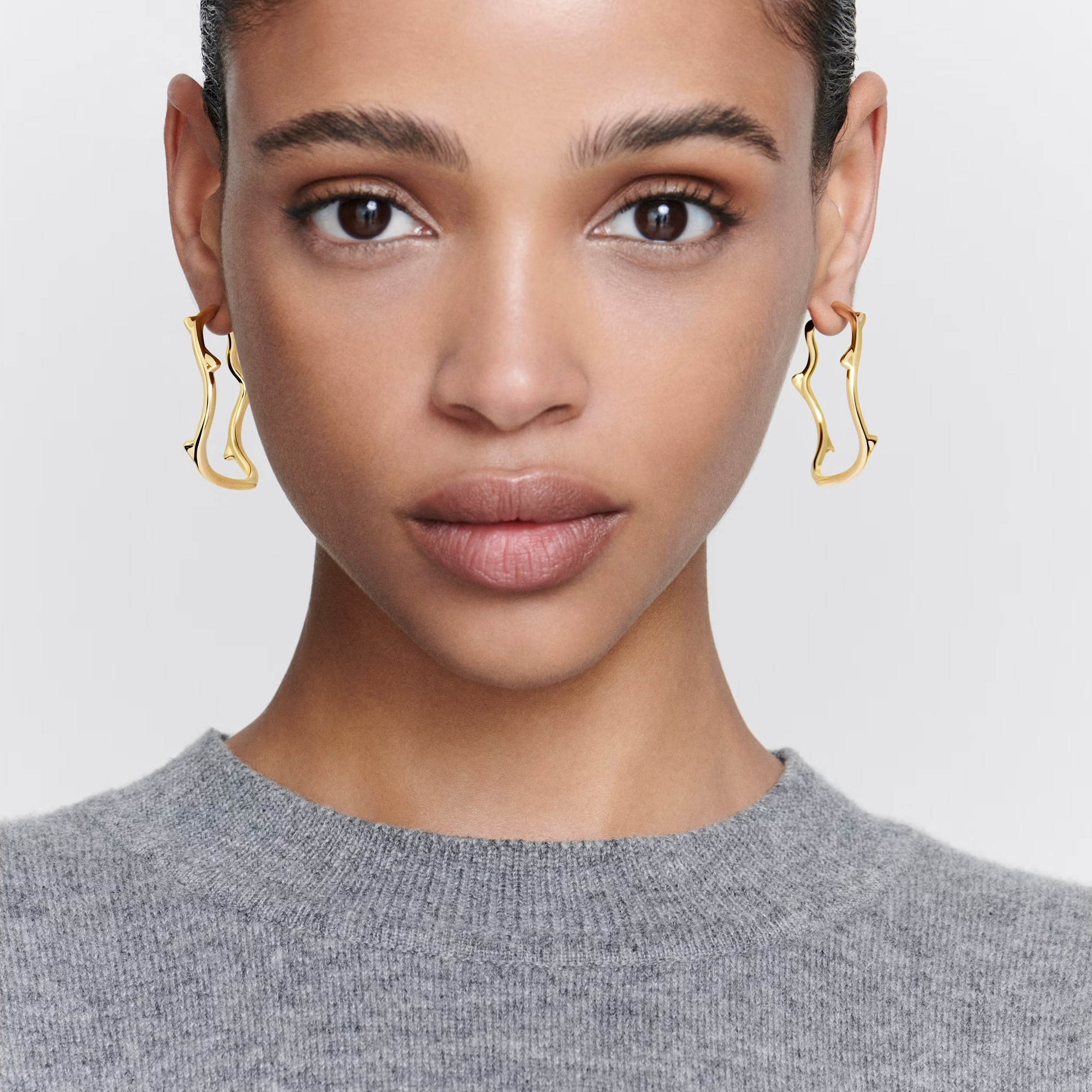 Dior gold on sale hoop earrings